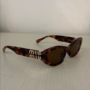 Miu Miu Tortoise Shell Sunglasses